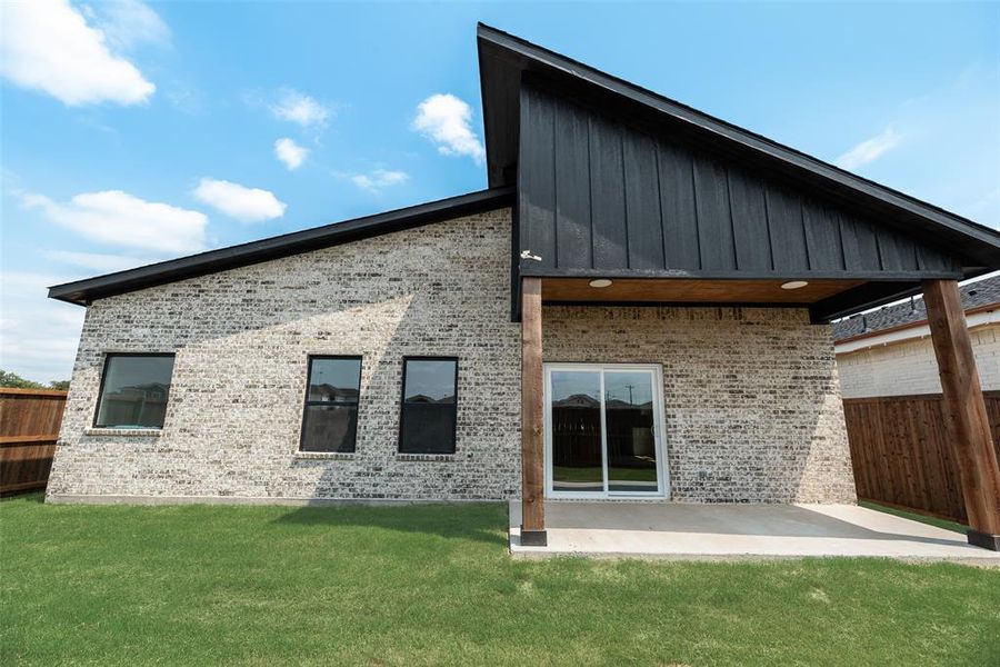 Front exterior of a new home in , Greenville, TX, highlighting curb appeal (Image 18). Front exterior of a new home in , Greenville, TX, highlighting curb appeal (Image 18).