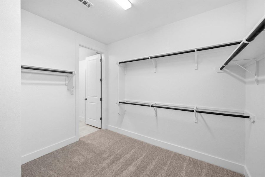 Walk-in closet in Primary Bedroom