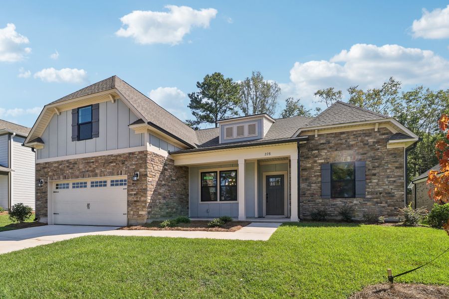 Representative exterior photo of a completed home built from the Edisto II by Great Southern Homes in The Cove, Sumter, SC (Image 14). Representative exterior photo of a completed home built from the Edisto II by Great Southern Homes in The Cove, Sumter, SC (Image 14).