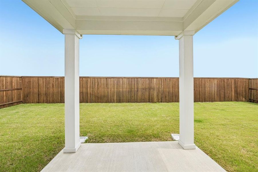 Exterior details and patio area of a home in Cottonwood Creek, Seagoville (Image 18).