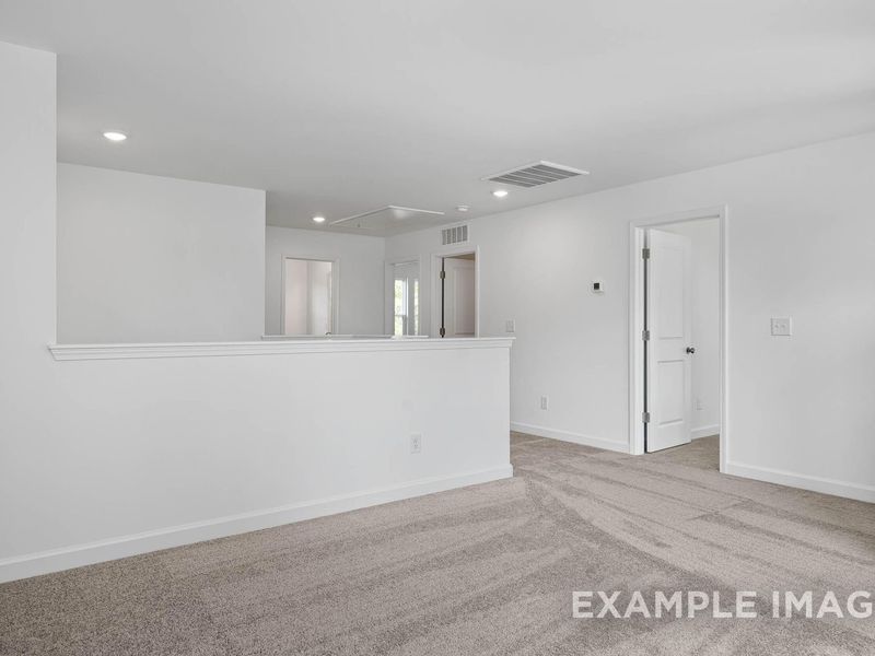 Spacious, unfurnished interior of a new home in Woodland Crossing, Zebulon (Image 19).