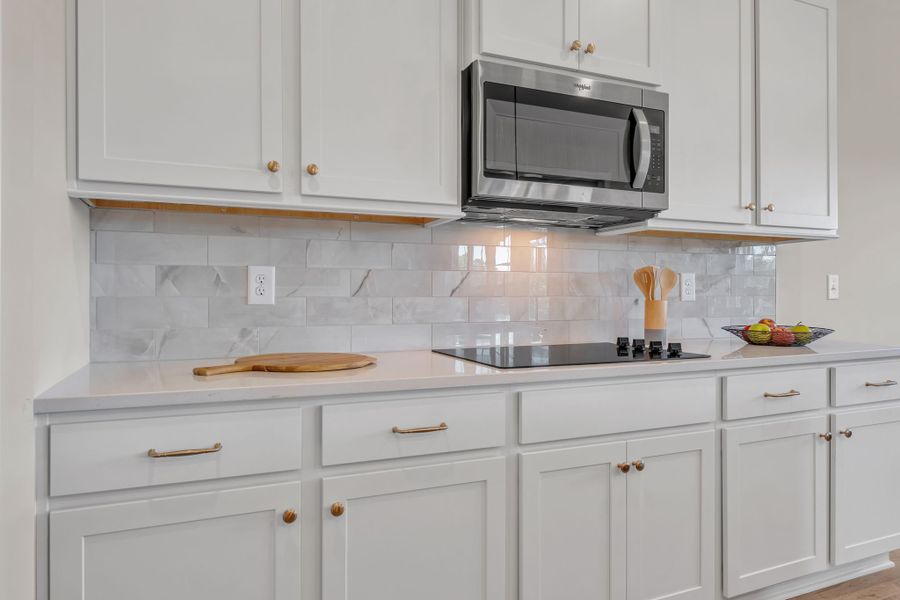 Representative furnished interior of a home built from the Ridgeland II by Regent Homes in Marlon's Creek, Spring Hill (Image 15).