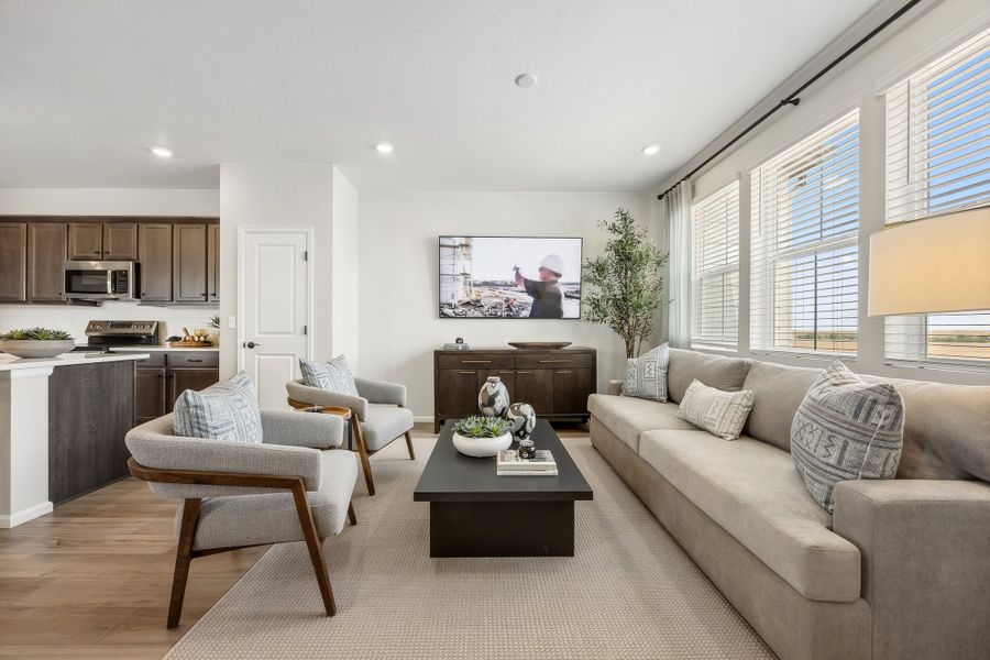 Representative furnished interior of a home built from the 2503 by Risewell Homes in Harvest Crossing, Aurora (Image 8).