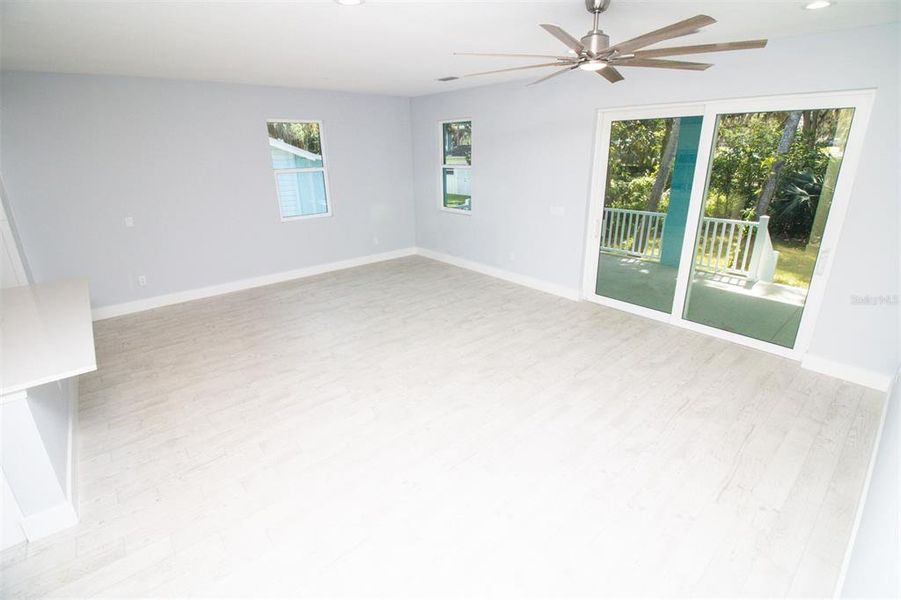 Spacious, unfurnished interior of a new home in , New Smyrna Beach (Image 9).