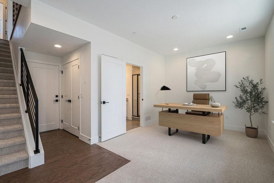 First Floor Office Suite:Photos including furniture are virtually staged; furniture is not included with this home. First Floor Office Suite:Photos including furniture are virtually staged; furniture is not included with this home.