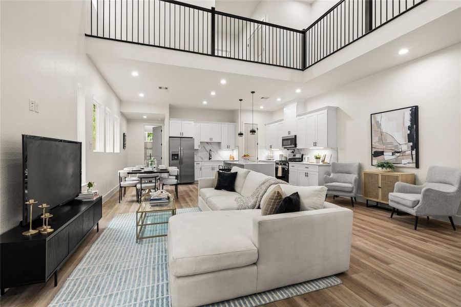 20 feet of ceiling height anchoring an open-concept main living area 20 feet of ceiling height anchoring an open-concept main living area