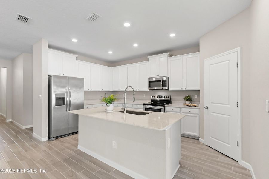 Furnished interior view inside a new home in Gentle Woods North, Jacksonville (Image 4).