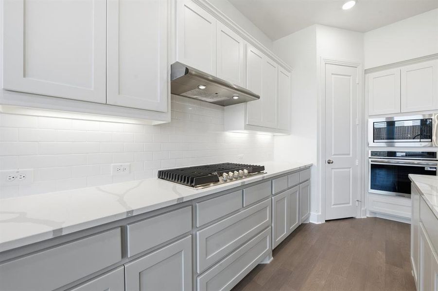 Furnished interior view inside a new home in Wildridge, Oak Point (Image 12).