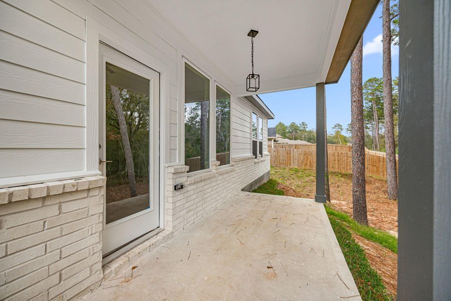 Exterior details and patio area of a home in , Conroe (Image 26). Exterior details and patio area of a home in , Conroe (Image 26).