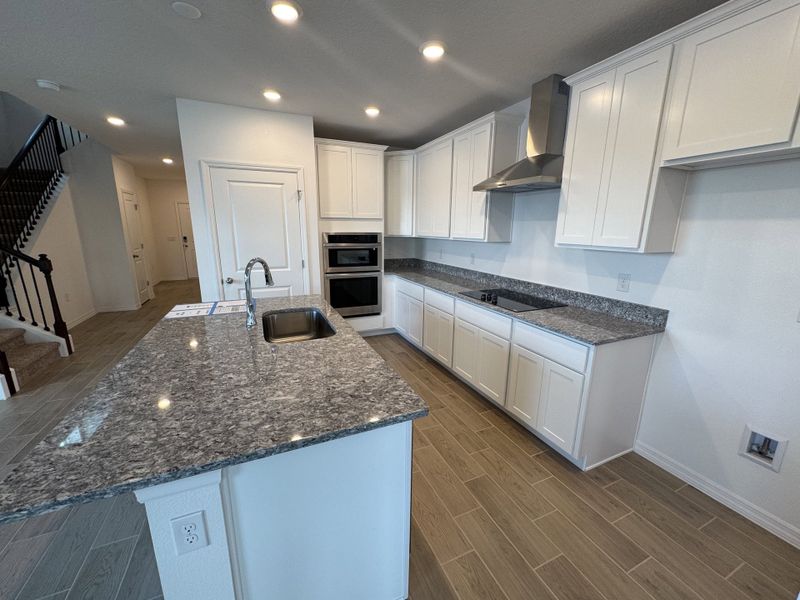 Furnished interior view inside a new home in Lake Deer Estates, Poinciana (Image 4).