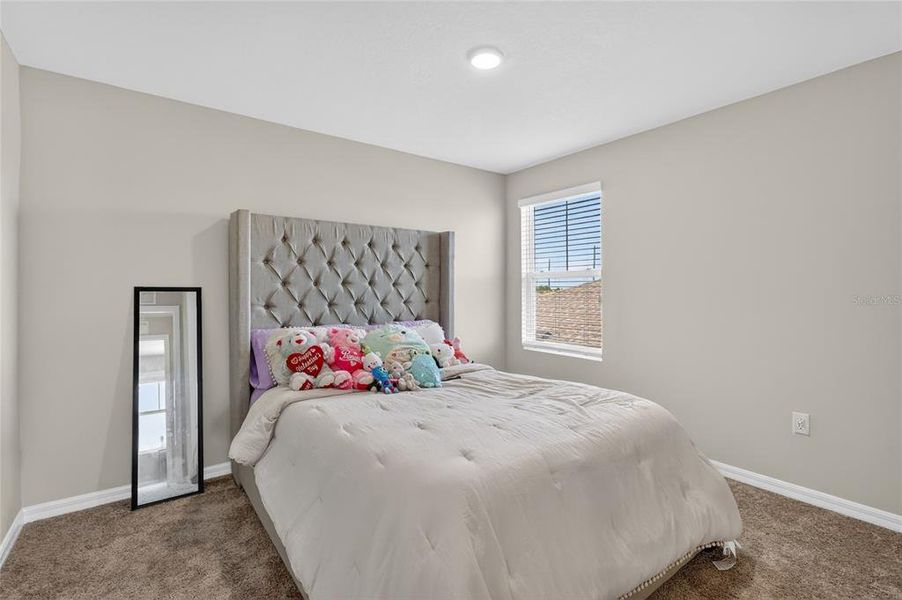 Furnished interior view inside a new home in Scenic Terrace, Haines City (Image 15).