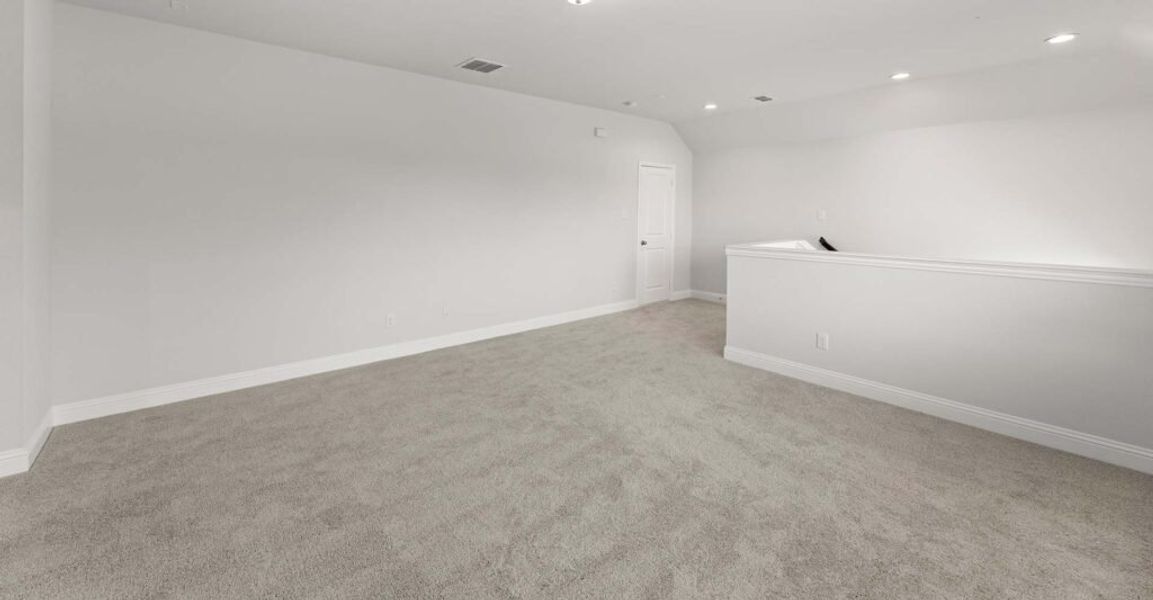 Representative exterior photo of a completed home built from the Goodrich by Impression Homes in Timberbrook, Justin, TX (Image 18).