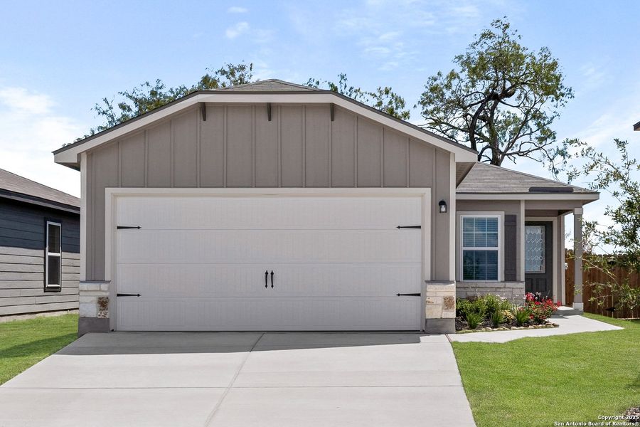 Front exterior of a new home in Blue Wing, San Antonio, TX, highlighting curb appeal (Image 1). Front exterior of a new home in Blue Wing, San Antonio, TX, highlighting curb appeal (Image 1).