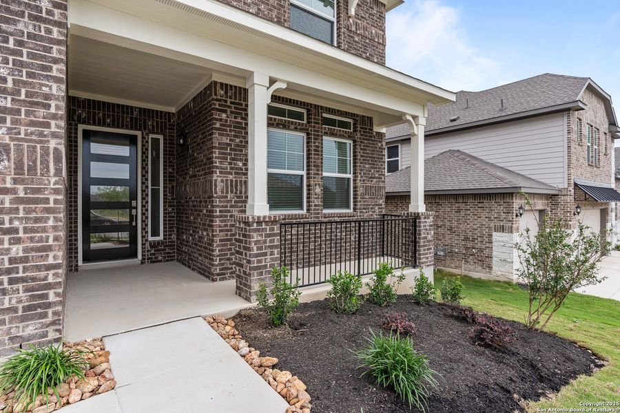 Front exterior of a new home in Buffalo Crossing – New Phase Now Preselling, Cibolo, TX, highlighting curb appeal (Image 2). Front exterior of a new home in Buffalo Crossing – New Phase Now Preselling, Cibolo, TX, highlighting curb appeal (Image 2).