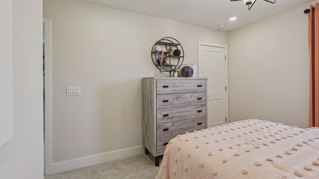 The Mangrove Second Floor Bedroom at Lakeside at Satilla by DRB Homes in Saint Cloud, FL The Mangrove Second Floor Bedroom at Lakeside at Satilla by DRB Homes in Saint Cloud, FL