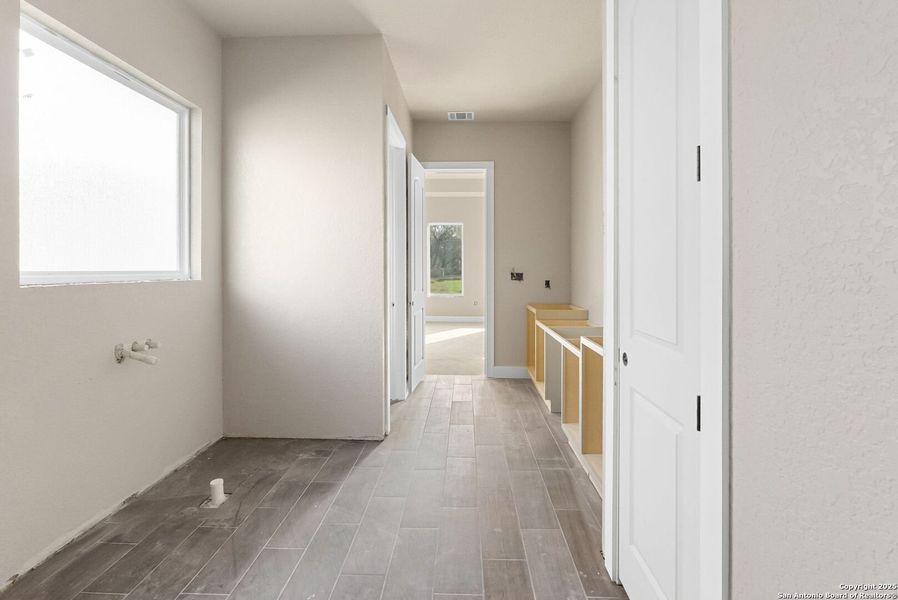 In-progress construction of a new home in , Adkins, TX (Image 30).