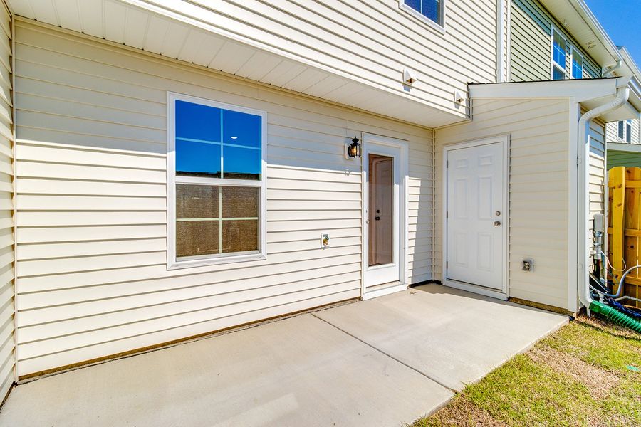 Exterior details and patio area of a home in Astoria, Columbia (Image 3).