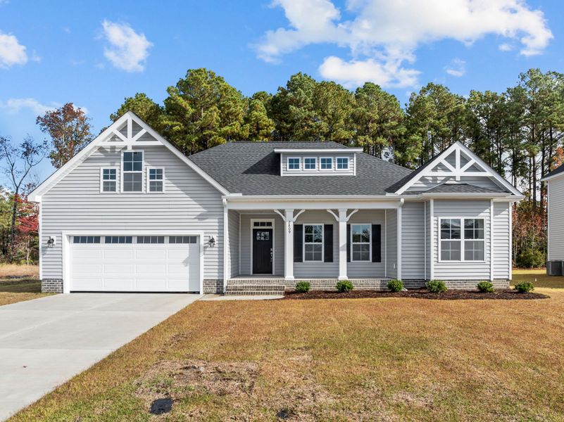 Front exterior of a new home in The Preserve at Langston, Winterville, NC, highlighting curb appeal (Image 2). Front exterior of a new home in The Preserve at Langston, Winterville, NC, highlighting curb appeal (Image 2).