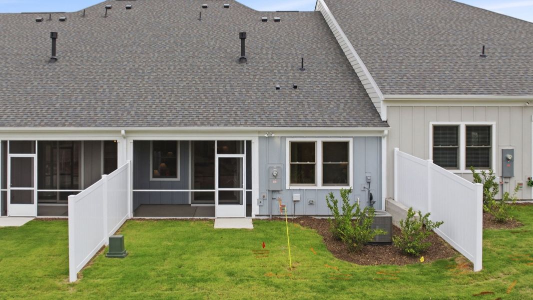 Exterior details and patio area of a home in The Courtyards at Oak Grove, Durham (Image 28).