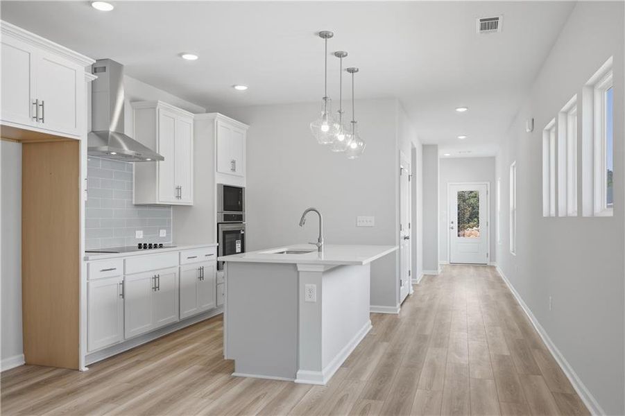 Furnished interior view inside a new home in The Bluffs, Canton (Image 6).
