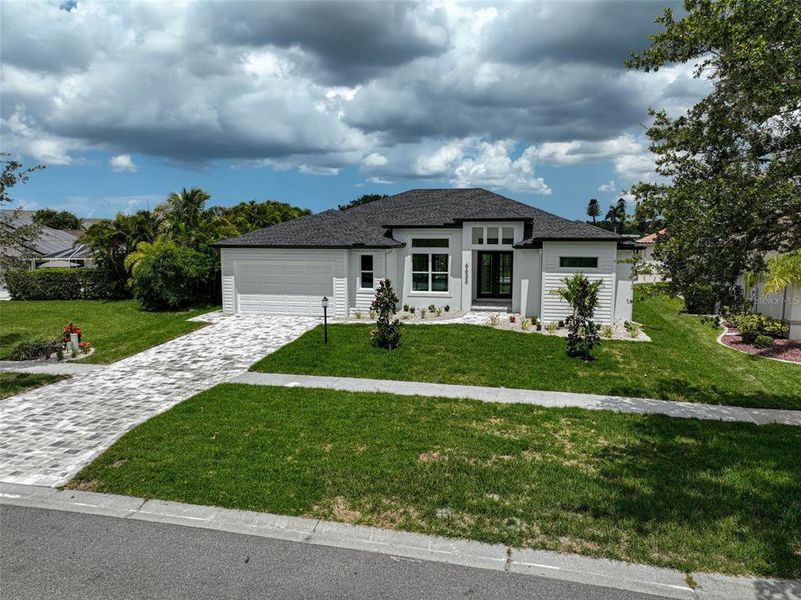 Front exterior of a new home in , North Port, FL, highlighting curb appeal (Image 31).