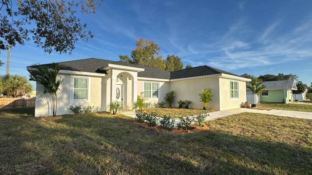 Front exterior of a new home in , Sebring, FL, highlighting curb appeal (Image 1).