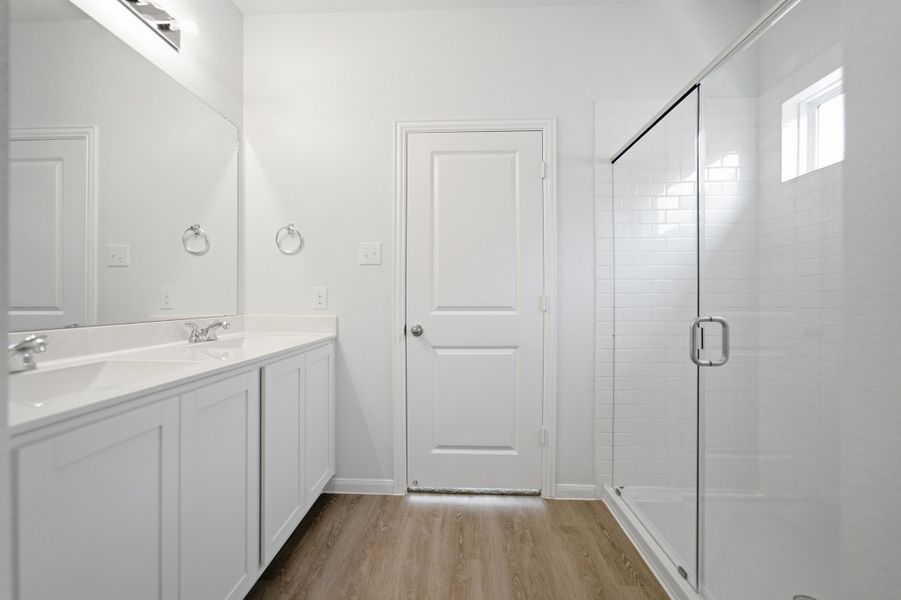 Furnished interior view inside a new home in The Pines at Seven Coves, Willis (Image 6).