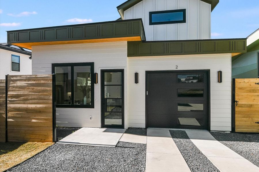 Property entrance featuring a garage