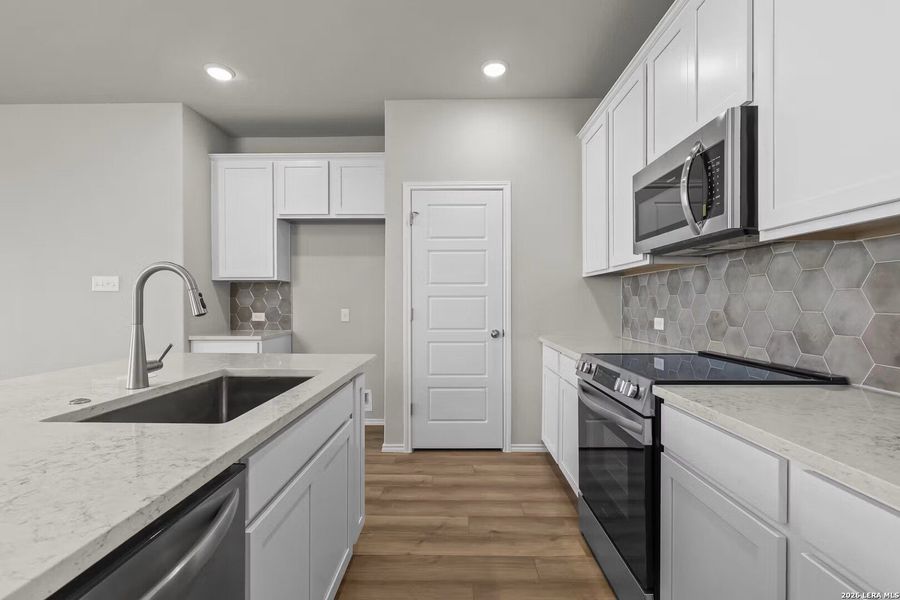 Furnished interior view inside a new home in Morgan Meadows, San Antonio (Image 9).