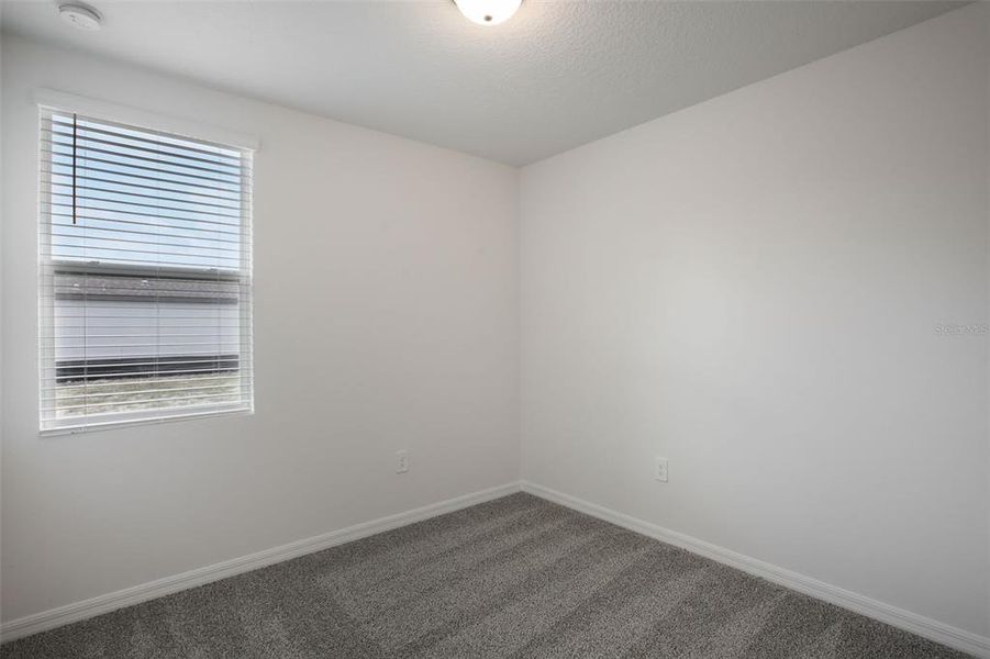 Spacious, unfurnished interior of a new home in Villamar - Classic Series, Winter Haven (Image 17).