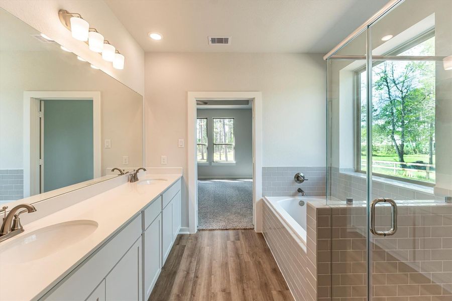 Furnished interior view inside a new home in Deer Pines, Conroe (Image 12).