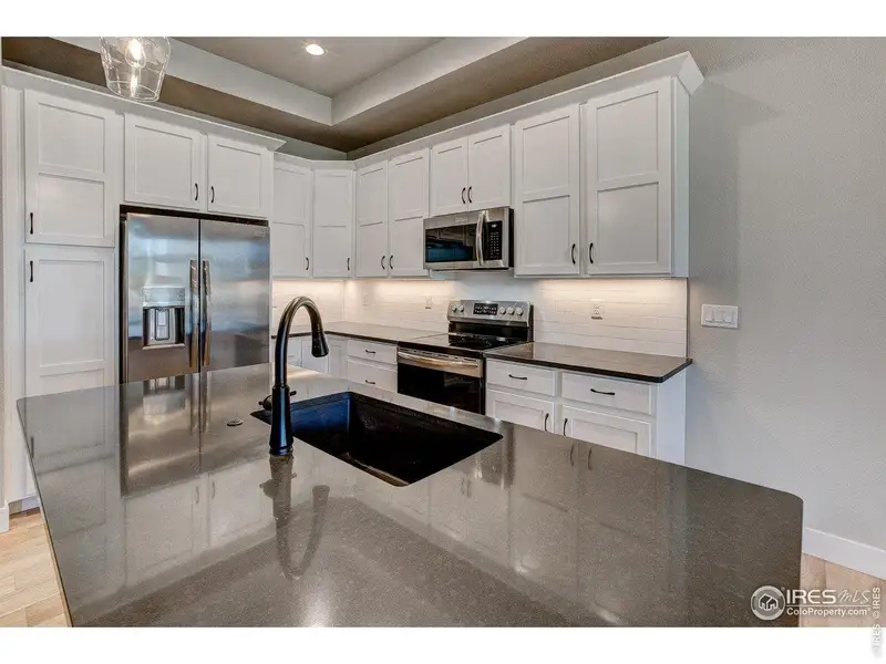 Furnished interior view inside a new home in , Longmont (Image 5).