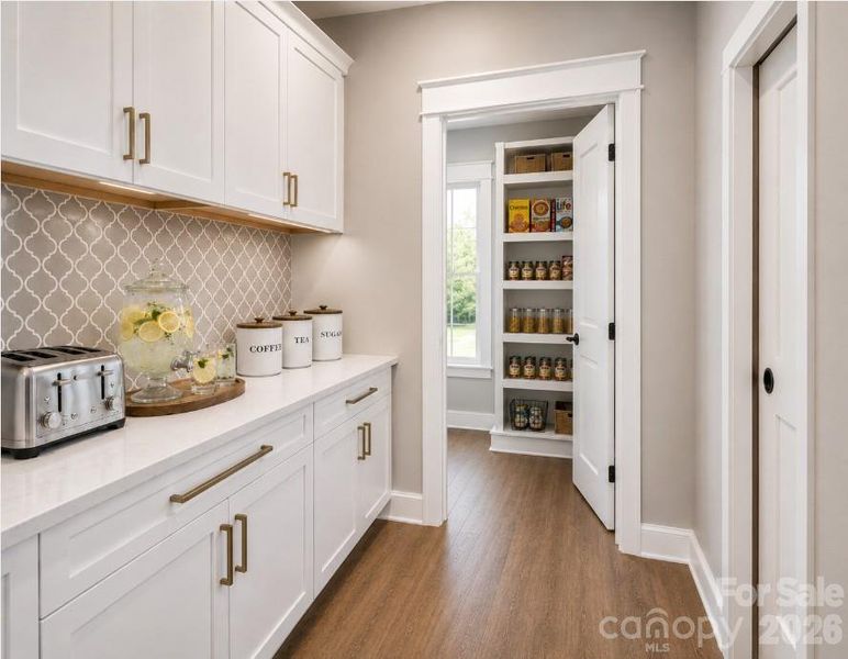 View from butler pantry to walk-in pantry (representative photo) View from butler pantry to walk-in pantry (representative photo)