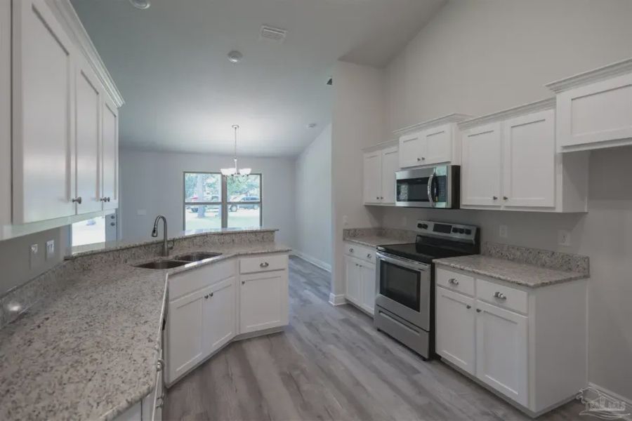 Furnished interior view inside a new home in Blossom Grove, Milton (Image 4).