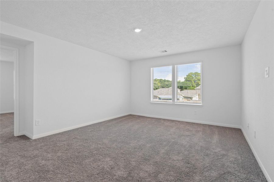 Spacious, unfurnished interior of a new home in Oakwood Trails, Tomball (Image 22).