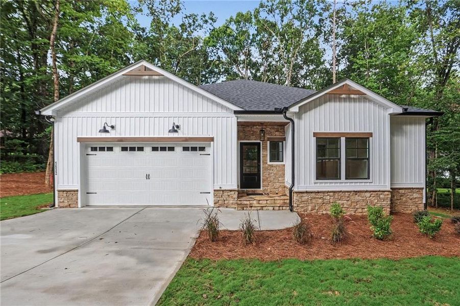 Front exterior of a new home in , Hiram, GA, highlighting curb appeal (Image 1). Front exterior of a new home in , Hiram, GA, highlighting curb appeal (Image 1).
