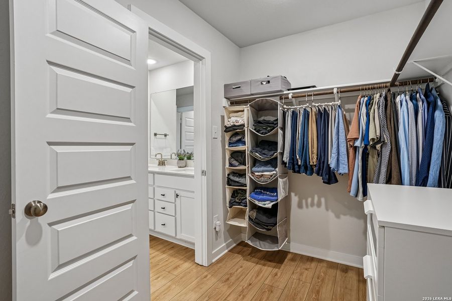 Furnished interior view inside a new home in University Village, San Antonio (Image 22).