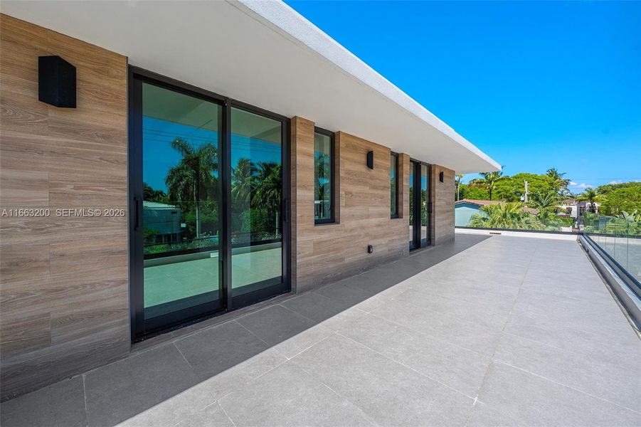 Exterior details and patio area of a home in , Miami Beach (Image 36). Exterior details and patio area of a home in , Miami Beach (Image 36).