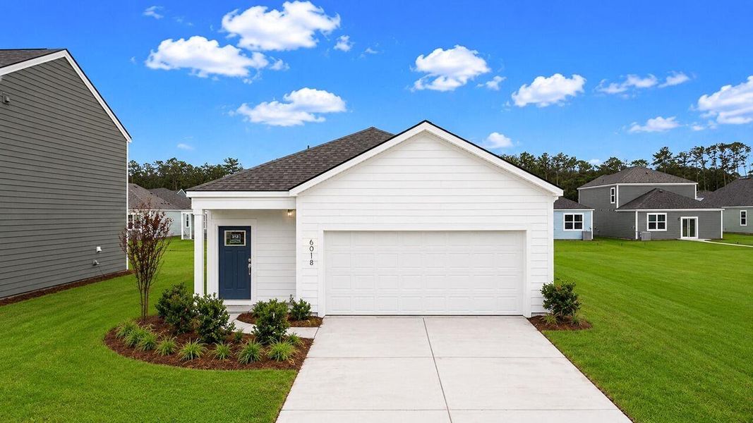 Front exterior of a new home in Hillcrest, Ravenel, SC, highlighting curb appeal (Image 1). Front exterior of a new home in Hillcrest, Ravenel, SC, highlighting curb appeal (Image 1).