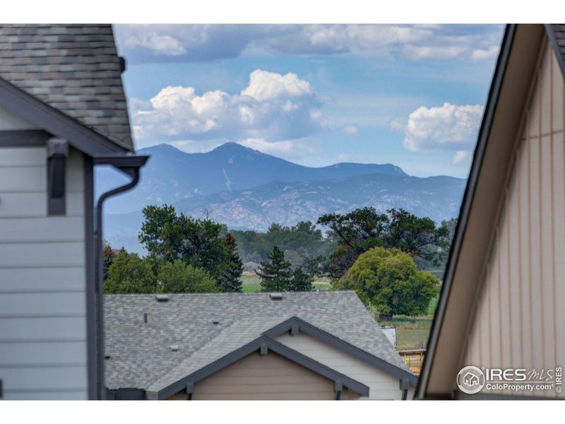 Front exterior of a new home in Highlands Preserve, Mead, CO, highlighting curb appeal (Image 2).