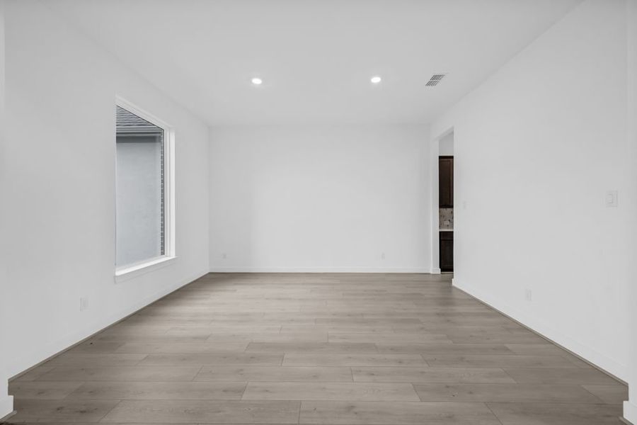 Spacious, unfurnished interior of a new home in Avalon at Friendswood 70s, Friendswood (Image 24).