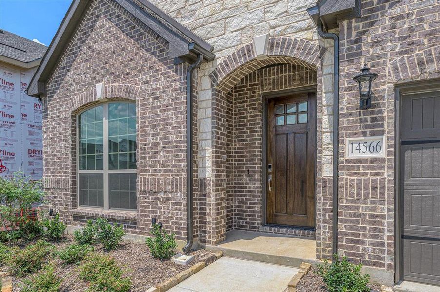 Exterior details and patio area of a home in Creekview Meadows, Pilot Point (Image 21).