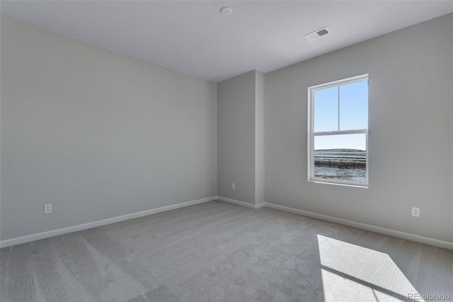 Spacious, unfurnished interior of a new home in Medley at Reunion Ridge, Commerce City (Image 19).