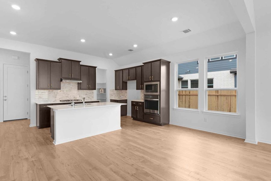 Furnished interior view inside a new home in Carillon, Manor (Image 6).