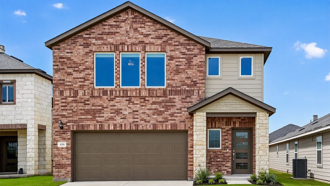 Representative exterior photo of a completed home built from the Merlin by Taylor Morrison in Stonewall Ranch, Liberty Hill, TX (Image 16). Representative exterior photo of a completed home built from the Merlin by Taylor Morrison in Stonewall Ranch, Liberty Hill, TX (Image 16).