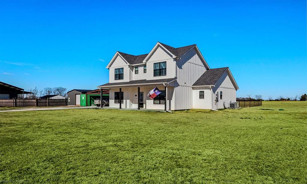Exterior details and patio area of a home in , Point (Image 22).