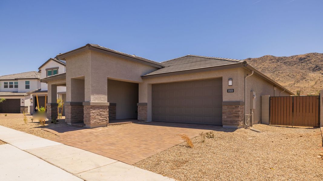 Front exterior of a new home in Prada, Phoenix, AZ, highlighting curb appeal (Image 23). Front exterior of a new home in Prada, Phoenix, AZ, highlighting curb appeal (Image 23).
