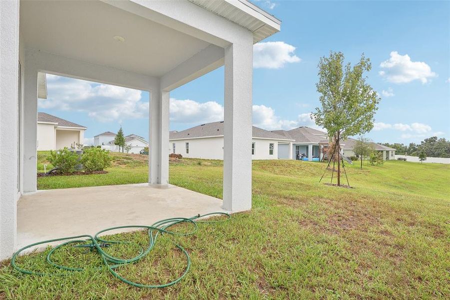 Exterior details and patio area of a home in Eagletail Landings, Howey-in-the-Hills (Image 4).