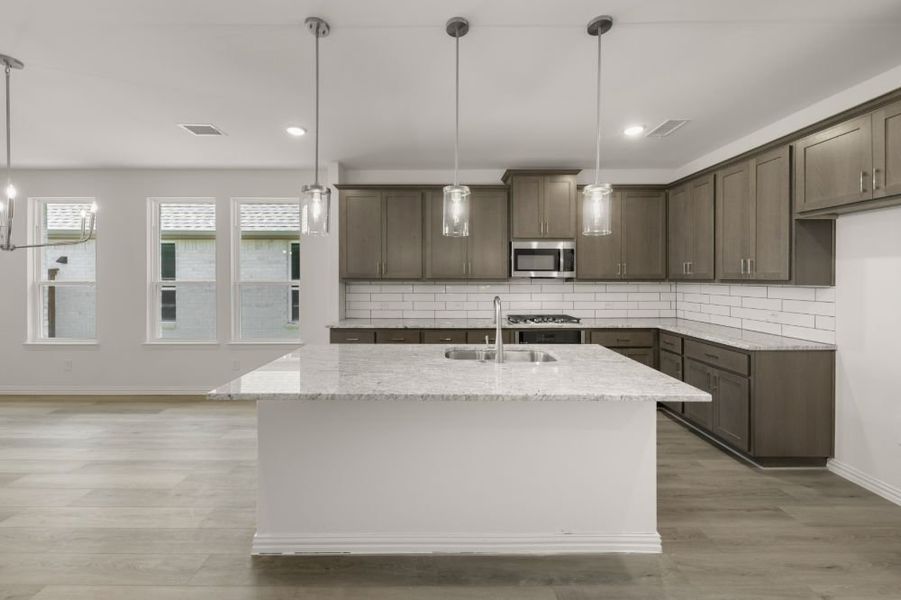 Representative furnished interior of a home built from the Cypress by UnionMain Homes in Edgewater, Fate (Image 6).