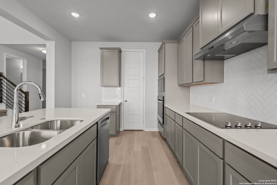 Furnished interior view inside a new home in Megan's Landing 50', Castroville (Image 9).